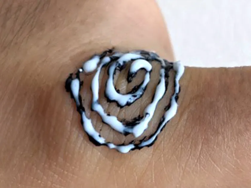 The ink used for the nanotattoos is actually two inks in one—a bottom layer containing graphene [black] and a top layer with embedded nanowires [white].ISTANBUL TECHNICAL UNIVERSITY/IEEE